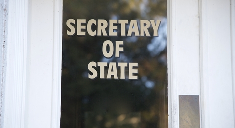 Secretary of State sign on door