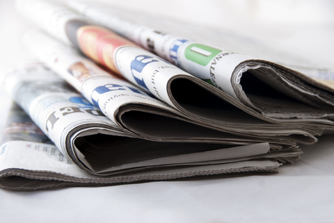 stack of newspapers
